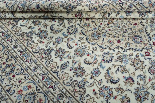 Close-up detail of 2000s Kashan rug from Iran / Persia showing Wool weave
