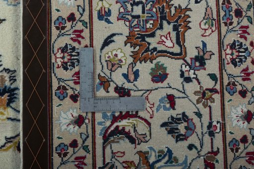 Backside of handmade 2000s Mashad rug showing knot structure and weave density