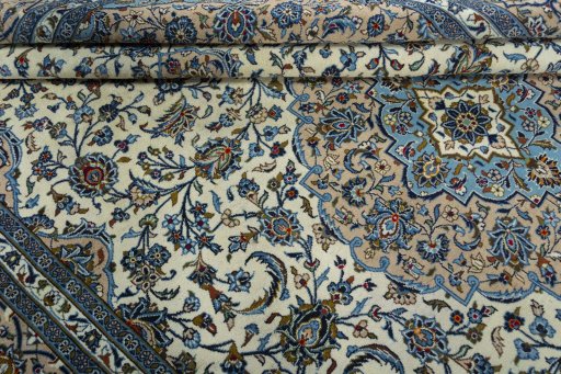 Close-up detail of 2000s Kashan rug from Iran / Persia showing Wool weave