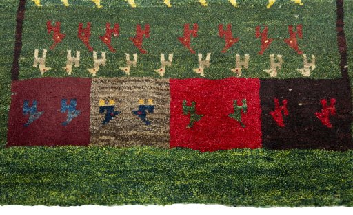 Central medallion detail of 2000s Persian Gabbeh rug from Pakistan