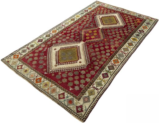 Corner detail of 1970s Persian Gabbeh rug showing border pattern and Wool pile