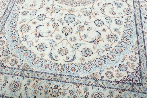 Close-up detail of 2000s Nain rug from Iran / Persia showing Wool weave