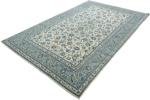 Corner detail of 2000s Kashan rug showing border pattern and Wool pile