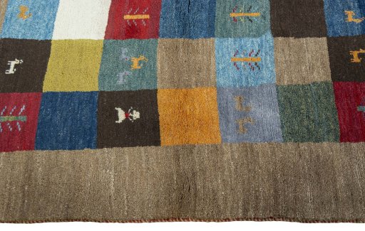 Close-up detail of 2000s Persian Gabbeh rug from Pakistan showing Wool weave