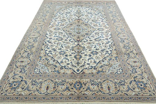 Surface texture of 2000s Kashan rug with natural Wool and intricate pattern