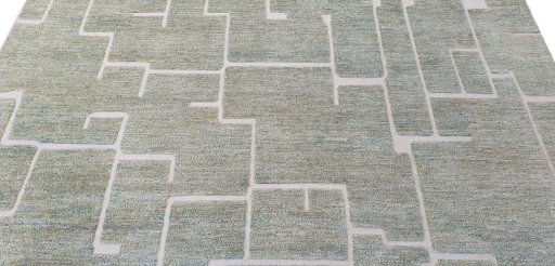 Backside of handmade New Morocco rug showing knot structure and weave density