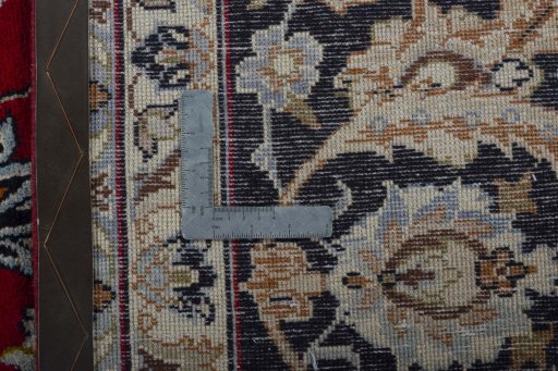 Backside of handmade 2000s Najafabad rug showing knot structure and weave density