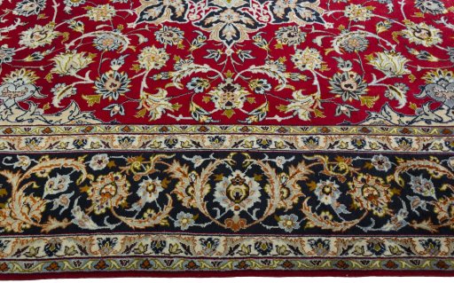 Corner detail of 2000s Najafabad rug showing border pattern and Wool pile