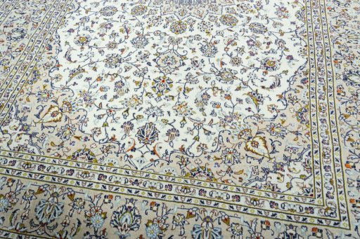 Close-up detail of 2000s Kashan rug from Iran / Persia showing Wool weave