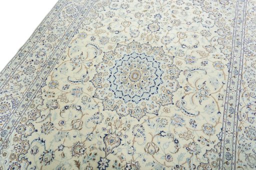 Backside of handmade 2000s Nain rug showing knot structure and weave density