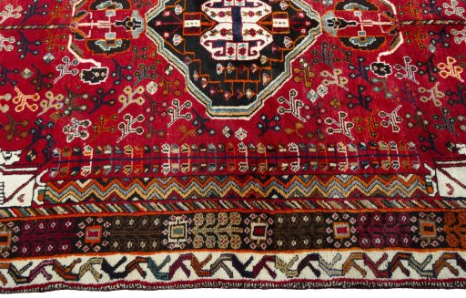 Full view of 1970s Shiraz rug from Iran / Persia, 254 × 153 cm in Red tones