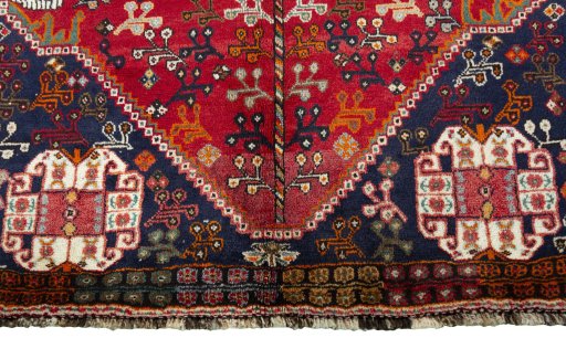 Close-up detail of 1970s Shiraz rug from Iran / Persia showing Wool weave