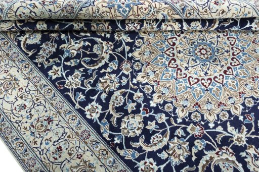 Close-up detail of New Nain rug from Iran / Persia showing Wool weave