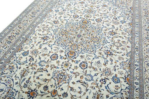 Backside of handmade 2000s Kashan rug showing knot structure and weave density