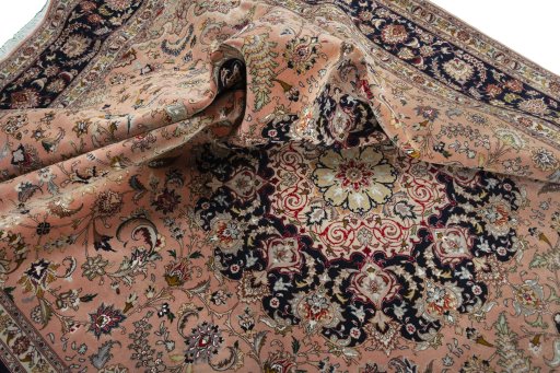 Surface texture of 2000s Tabriz 50/60/70 Raj rug with natural Cork and intricate pattern