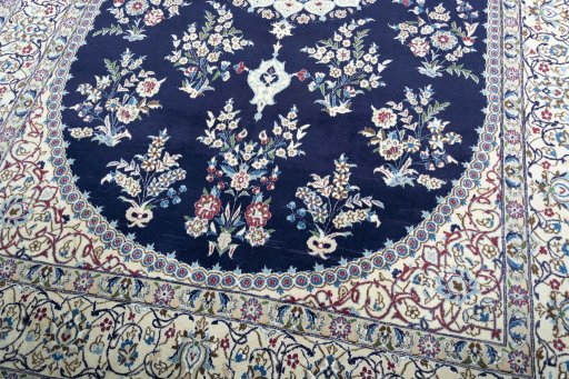 Close-up detail of 2000s Nain rug from Iran / Persia showing Wool weave