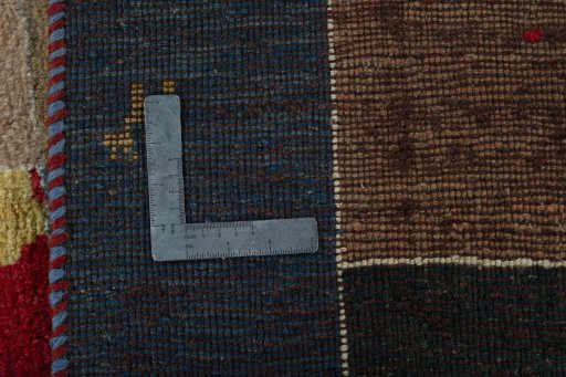 Close-up detail of 2000s Persian Gabbeh rug from Pakistan showing Wool weave