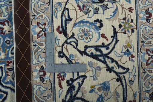 Backside of handmade 2000s Nain rug showing knot structure and weave density