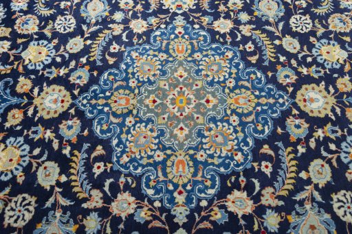 Central medallion detail of 2000s Kashan rug from Iran / Persia