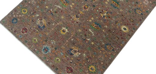 Backside of handmade New Farahan rug showing knot structure and weave density
