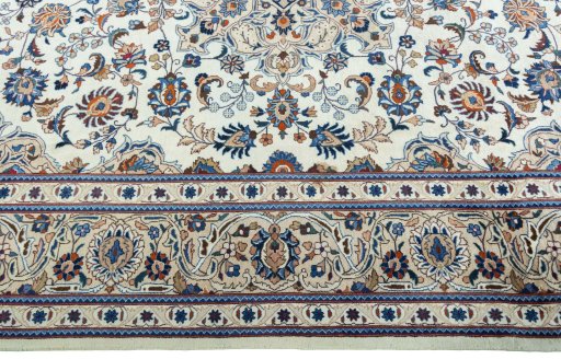 Corner detail of 2000s Kashmar rug showing border pattern and Wool pile