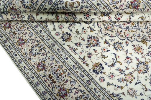 Close-up detail of 2000s Kashan rug from Iran / Persia showing Wool weave