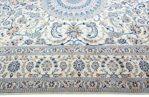 Corner detail of 2000s Nain rug showing border pattern and Wool pile