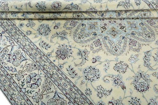 Close-up detail of 2000s Nain rug from Iran / Persia showing Wool weave