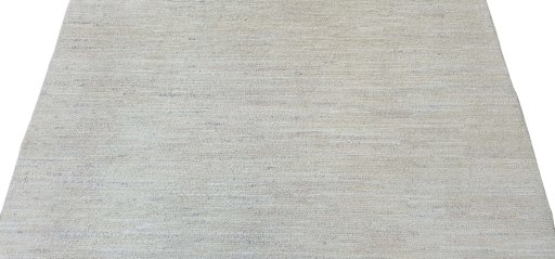 Backside of handmade New Morocco rug showing knot structure and weave density