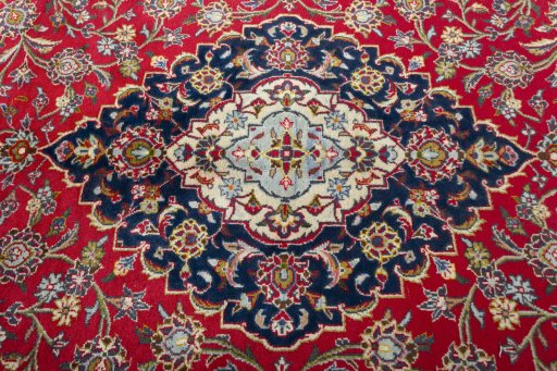 Central medallion detail of 2000s Kashan rug from Iran / Persia