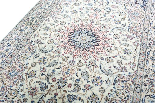 Backside of handmade 2000s Nain rug showing knot structure and weave density