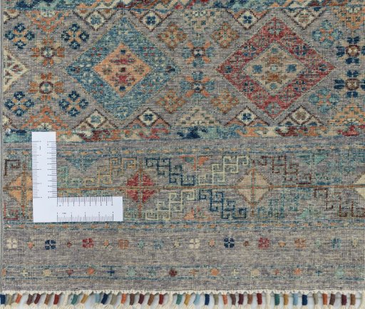 Corner detail of New Samarkand rug showing border pattern and Wool pile