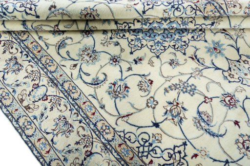 Close-up detail of 2000s Nain rug from Iran / Persia showing Wool weave