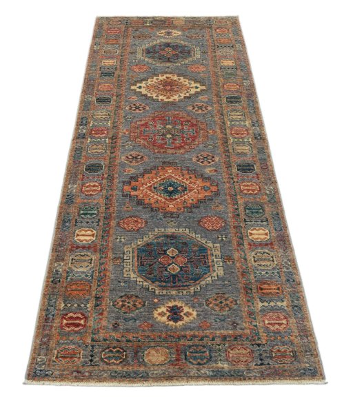 Surface texture of New Kazak rug with natural Wool and intricate pattern
