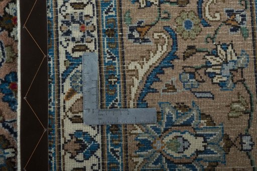 Backside of handmade 2000s Kashmar rug showing knot structure and weave density