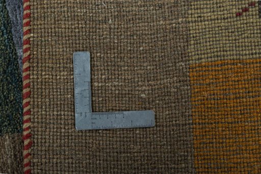 Close-up detail of 2000s Persian Gabbeh rug from Pakistan showing Wool weave