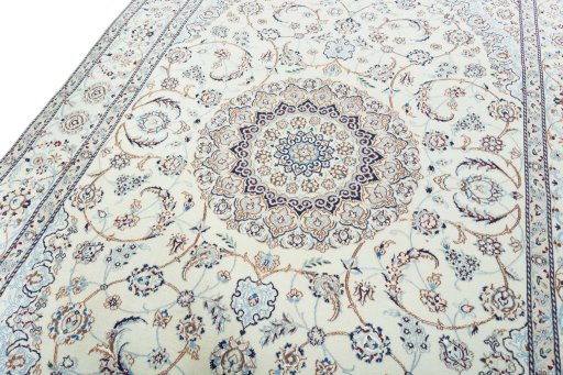 Backside of handmade 2000s Nain rug showing knot structure and weave density