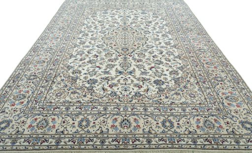 Surface texture of 2000s Kashan rug with natural Wool and intricate pattern