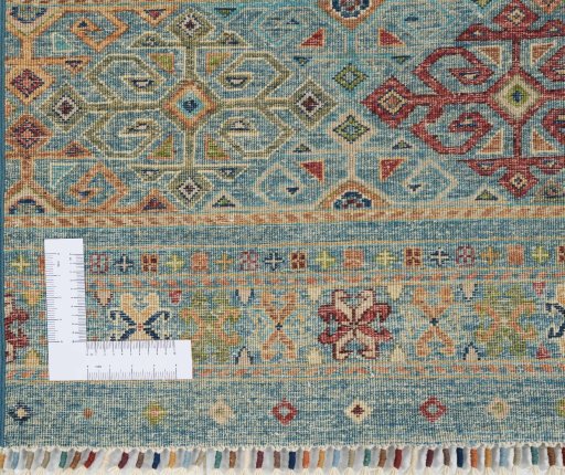 Corner detail of New Samarkand rug showing border pattern and Wool pile