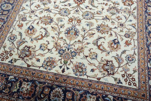 Close-up detail of 2000s Mashad rug from Iran / Persia showing Wool weave