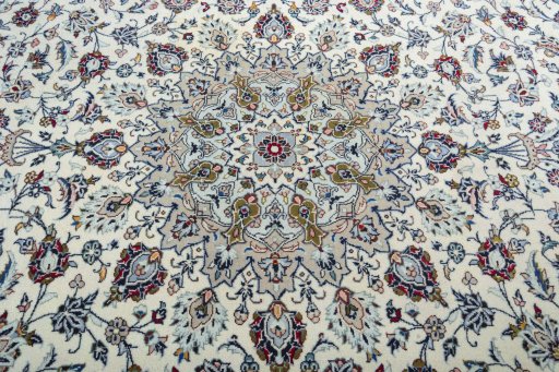 Central medallion detail of 2000s Kashan rug from Iran / Persia