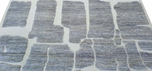 Backside of handmade New Morocco rug showing knot structure and weave density