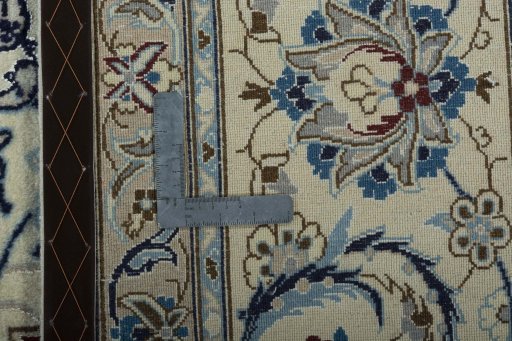 Backside of handmade 2000s Nain rug showing knot structure and weave density