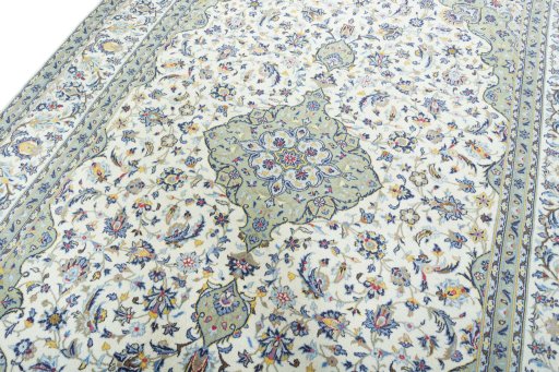Backside of handmade New Kashan rug showing knot structure and weave density