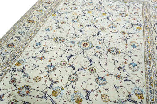 Backside of handmade 2000s Kashan rug showing knot structure and weave density