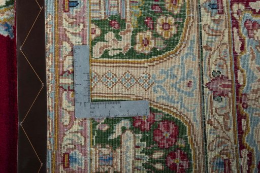 Backside of handmade 1970s Kerman rug showing knot structure and weave density