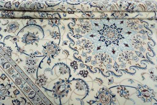 Close-up detail of 2000s Nain rug from Iran / Persia showing Wool weave