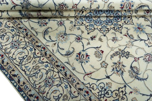 Close-up detail of 2000s Nain rug from Iran / Persia showing Wool weave