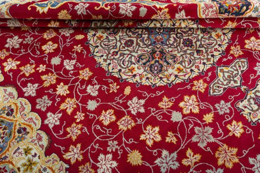 Close-up detail of 2000s Kashan rug from Iran / Persia showing Wool weave