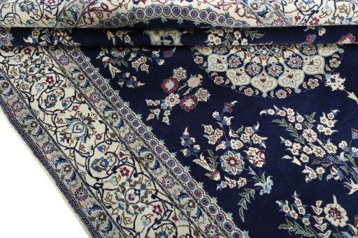 Close-up detail of 2000s Nain rug from Iran / Persia showing Wool weave